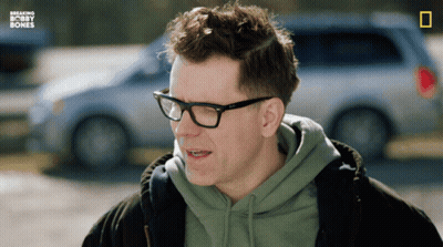 Man In Glasses And Green Hoodie With Breaking Bobby Bones GIF