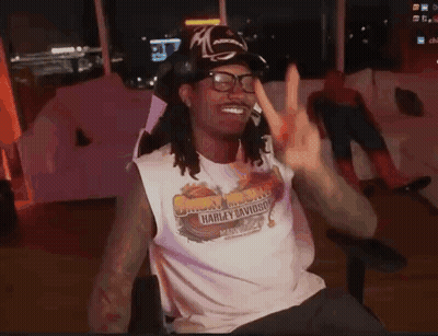 Man In Glasses And Harley Davidson Shirt Giving Peace Sign GIF