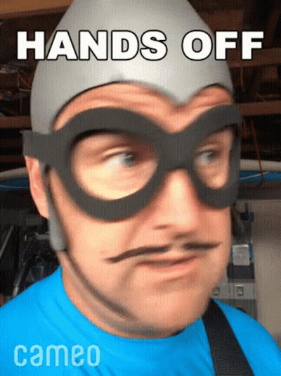Man In Glasses And Hat Saying Hands Off GIF