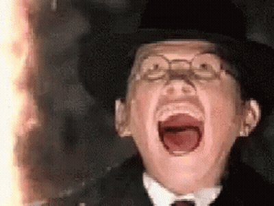 Man In Glasses And Hat Screaming With Mouth Open GIF