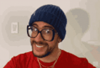 Man In Glasses And Hat Smiling GIF