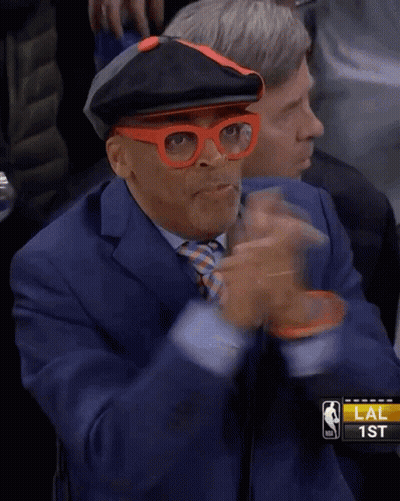 Man In Glasses And Hat Thumbs Up At Basketball Game GIF