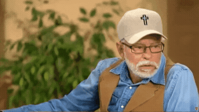 Man In Glasses And Hat With Cross GIF