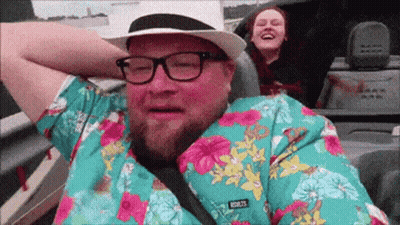 Man In Glasses And Hawaiian Shirt With Rem275 Patch GIF