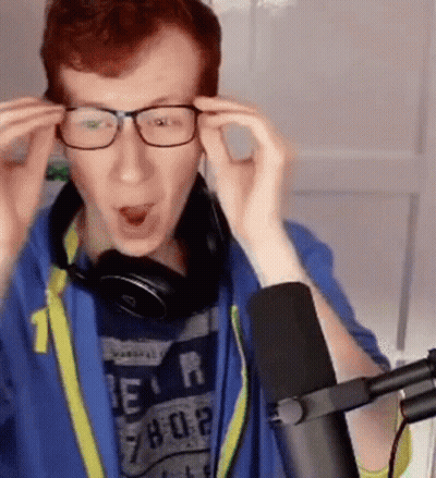 Man In Glasses And Headphones At Microphone GIF