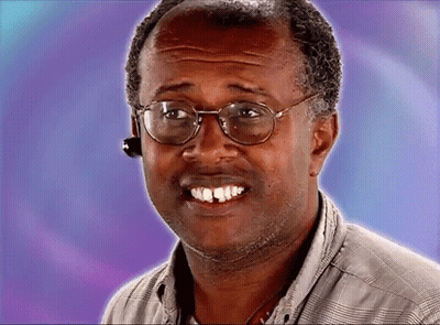 Man In Glasses And Headset Looking At Camera GIF
