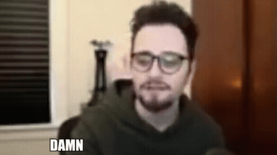 Man In Glasses And Hoodie Saying Damn GIF