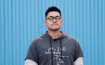 Man In Glasses And Hoodie Saying E T + 1 = 0 GIF