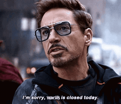 Man in Glasses and Jacket Says I'm Sorry Texas Is Closed Today