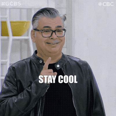 Man In Glasses And Leather Jacket Points To Stay Cool GIF