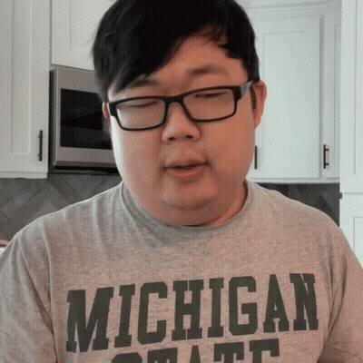 Man In Glasses And Michigan State T-Shirt GIF