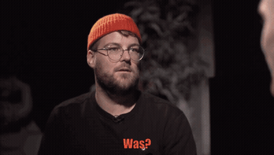 Man In Glasses And Orange Hat Being Punched GIF