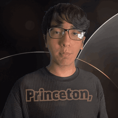 Man In Glasses And Princeton Shirt Looking At Camera GIF