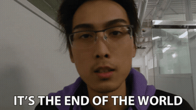 Man In Glasses And Purple Sweatshirt Says It's The End Of The World GIF