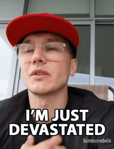 Man In Glasses And Red Hat Saying I'm Just Devastated GIF
