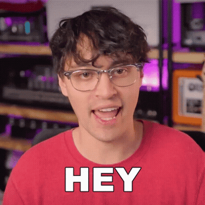 Man In Glasses And Red Shirt Saying Hey GIF