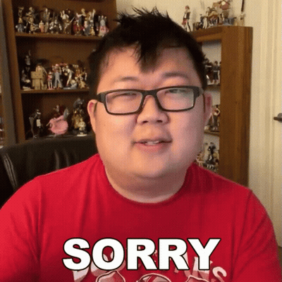 Man In Glasses And Red Shirt Saying Sorry GIF