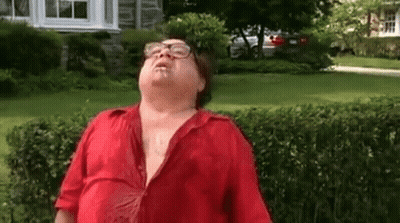 Man In Glasses And Red Shirt Standing In Yard GIF