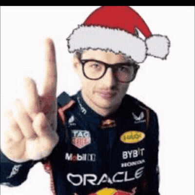 Man In Glasses And Santa Hat Giving Peace Sign GIF