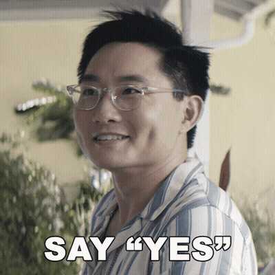 Man In Glasses And Striped Shirt Say Yes GIF