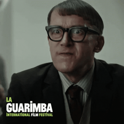 Man In Glasses And Suit La Guarimba International Film Festival Poster GIF