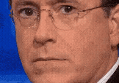 Man In Glasses And Suit Making Face GIF