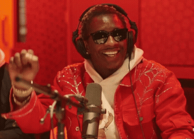 Man In Glasses And Suit Making Funny Face GIF