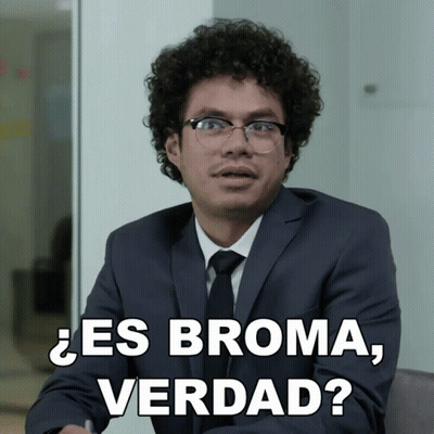 Man In Glasses And Suit Saying Es Broma Verdad GIF