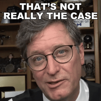 Man In Glasses And Suit Saying That's Not Really The Case GIF