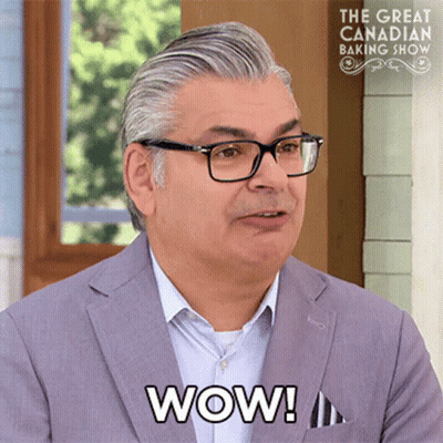 Man In Glasses And Suit Says Wow On Great Canadian Baking Show GIF