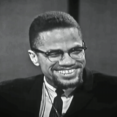 Man In Glasses And Suit Smiling GIF