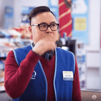 Man In Glasses And Vest Making Funny Face GIF
