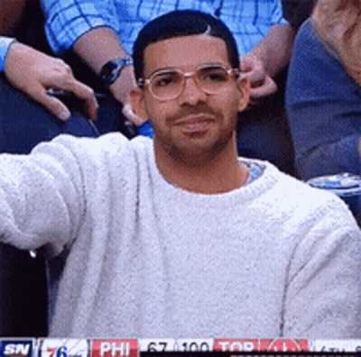 Man In Glasses And White Sweater Watching Game GIF