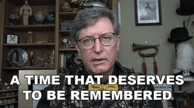 Man In Glasses And Yellow Bow Tie Saying A Time That Deserves To Be Remembered GIF