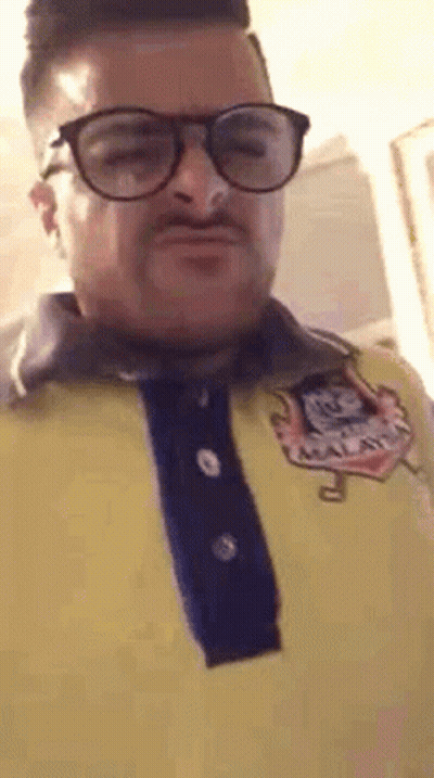 Man In Glasses And Yellow Shirt GIF