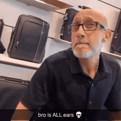 Man In Glasses Black Shirt Bro Is All Ears GIF