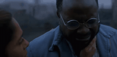 Man In Glasses Comforted By Woman In Blue Jacket GIF