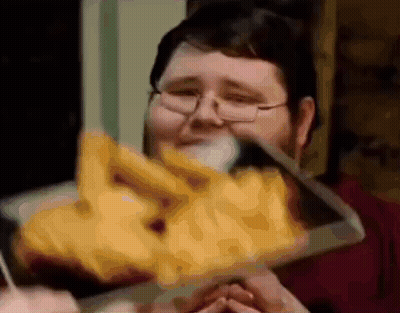 Man In Glasses Eating Lots Of Food GIF