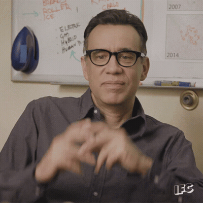 Man In Glasses In Front Of Whiteboard Saying GM Hybrid GIF