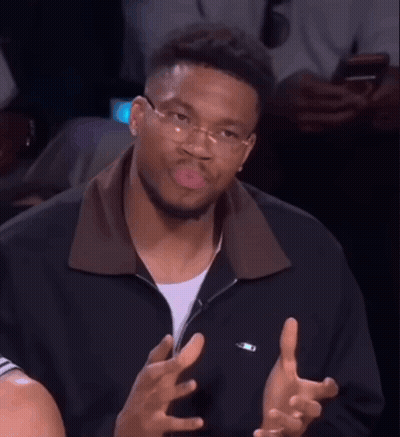 Man In Glasses Making Funny Face In Stadium GIF