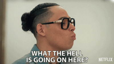 Man In Glasses Saying What The Hell Is Going On Here GIF