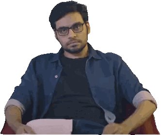 Man In Glasses Sitting In Chair Holding Paper Sticker