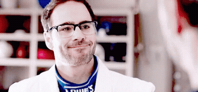 Man In Glasses Smiling In Lowe's Shirt GIF