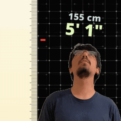 Man In Glasses Standing By Ruler Saying 155 Cm 5'1 GIF