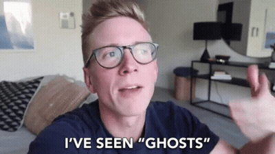 Man In Glasses Talking About Ghosts GIF