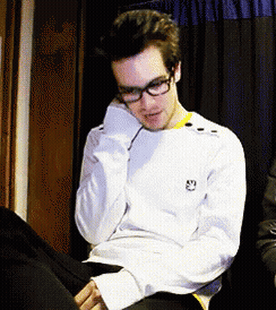 Man In Glasses With Smiley Sweater GIF
