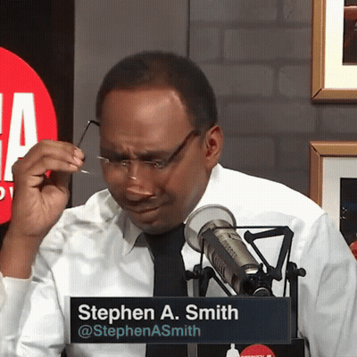 Man In Glasses With Stephen A. Smith Name Tag At Microphone GIF