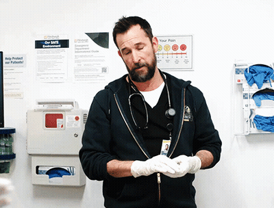 Man In Gloves In Front Of Your Pain Sign GIF