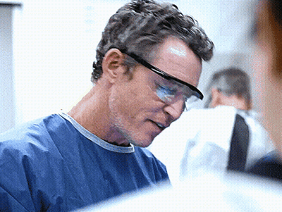 Man In Goggles And Blue Gown GIF
