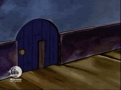 Man In Goggles And Yellow Striped Shirt Making Face GIF